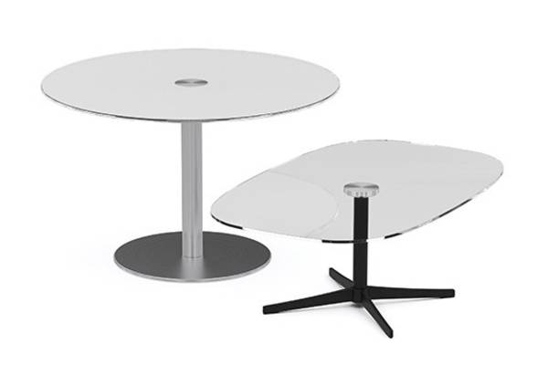 Axium tables come in a variety of materials, shapes, sizes and heights. Clear and white back painted security glass provide an affordable, attractive and durable surface for café and break areas. Wood tops feature an elegant expressed plywood knife edge to match our Cempa side chair oak and walnut finishes, while the simple white laminate tops pair well with the X and disc bases. Most tops are available in occasional, lounge, desk and bar heights and are offered with bright metal or black matte base finishes.