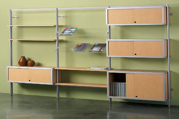 Our MS Models are a versatile, functional collection offering clean, contemporary solutions utilizing available wall space. Elliptical uprights with shelving and credenzas provide the ultimate in easy access to book & reference materials as well as decorative or 